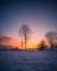 Calm Evening Photo with the Field and Forest with the Sunset in