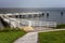 Calm expanse of water with a pier for ships