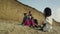 Calm family spend time together on sea beach. Happy people taking photos outside