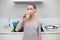 Calm gorgeous blonde drinking from disposable cup