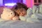 Calm kids sleep. Child boy sleep with a toy teddy bear, napping. Kid sleeping in bed.