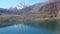 Calm Lake with Enormous Snow Mountain