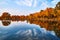 Calm lake in the fall sunset