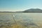 Calm lake landscape, muddy lake, fisherman path, mountain landscape