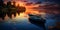 Calm by the lake. Rowing boat on the surface of the water at sunset.