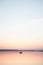 Calm lake sunset boat couple minimalism