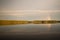 Calm lake in Sweden with rainbow reflecting on the surface