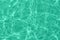 calm mint colored clear water surface