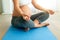 Calm mommy, calm baby. a pregnant woman meditating on an exercise mat at home.