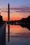 Calm morning at the Reflecting Pool Looking Toward the Washington Monument and its Reflection at Sunrise