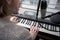 Calm musician playing piano in studio
