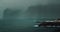 Calm ocean landscape with lonely yacht and gray storm clouds over black cliffs. Fog covered high sea rocks on volcanic