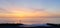 Calm pastel colored beach sea ocean sunset