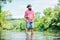 Calm and peaceful mood. Fisherman alone stand in river water. Man bearded fisherman. Fisherman fishing equipment. Some
