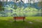A calm place to rest and relax. An empty wooden bench. Switzerland