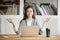 Calm relaxed woman meditating with laptop, no stress at work