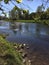 Calm riverbank scene in Scotland, UK