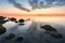 Calm sea of rocky beach of Black Sea after sunset, Anapa, Russia