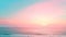 Calm sea under a sky with pastel dawn colors, creating a tranquil and serene landscape