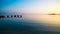 Calm Seascape. Pier and Sea at Sunset in Summer.