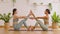 Calm of wellness Couple Asian young woman sit on yoga mat doing breathing exercise yoga boat pose or diamond shape together.Yoga