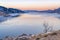 Calm winter dusk over mountain lake