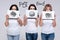 Calm women standing and protesting against eating unhealthy fast food