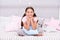 Calming activity for kids. Ways to relax before bedtime. Relaxation Exercises for Falling Asleep. Little girl in pajamas