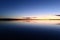 Calming twilight blue sky over calm purity water lake  dusky dreamlike silence of nature