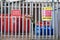 Calor gas cylinder bottles in cage fence at caravan park site in Porthcawl UK