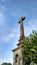 Calvary made of stone with blue sky above