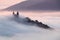 Calvary over clouds in Banska Stiavnica, Slovakia