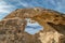 Calvi in Corsica viewed through hole in rock