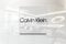 Calvin klein on glossy office wall realistic texture