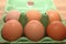 Camberley, UK - Dec 31 2016: Brown eggs in green box with British Egg Tracking Code and Lion Brand