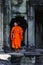 Cambodia Angkor wat gallery with a monk