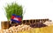 Cambodia flag waving with stack of money coins and piles of wheat