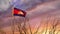 Cambodia flagpole at sunset flying a freedom flag - 3d animation