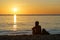 Cambodia. Koh Rong Samloem Island, woman sitting on the beach