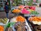 Cambodia, Siem Reap 12/08/2018 young Asian girl sells fruit on a city street