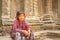Cambodian child in Ta Prohm ancient temple, Angkor Thom, Siem Reap, Cambodia.