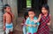 Cambodian children begging for some candy at the temple