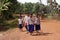 Cambodian students walking on road