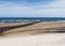 Cambois beach in Northumberland, UK with wind turbines