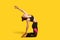 Camel pose. Athletic woman with hair bun in tight sportswear practicing yoga, doing spinal back exercise