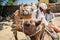 Camel Seller in Traditional Eritrean Dress on the Animal Market