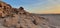 Camel Skeleton on a stony cliff in the desert