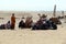 Camels await tourist riders at the Great pyramid