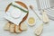 Camembert cheese with baguette croutons and a sprig of rosemary with honey on the table.