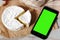Camembert cheese traditional Normandy French with smartphone